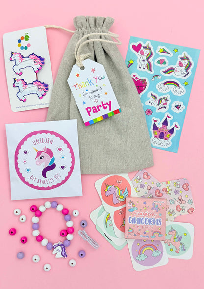 Unicorn Cotton Party Bag, showing included contents and an optional thank-you tag; assorted colours and designs may vary.