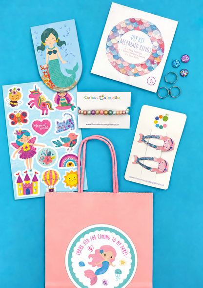 Eco Mermaid Party Bag - Deluxe showing its included contents; one assorted version of each item supplied