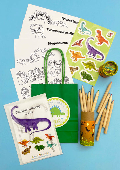 Dinosaur Mini Party Bag with Colouring, showing included contents and an optional label; assorted colours and designs may vary.