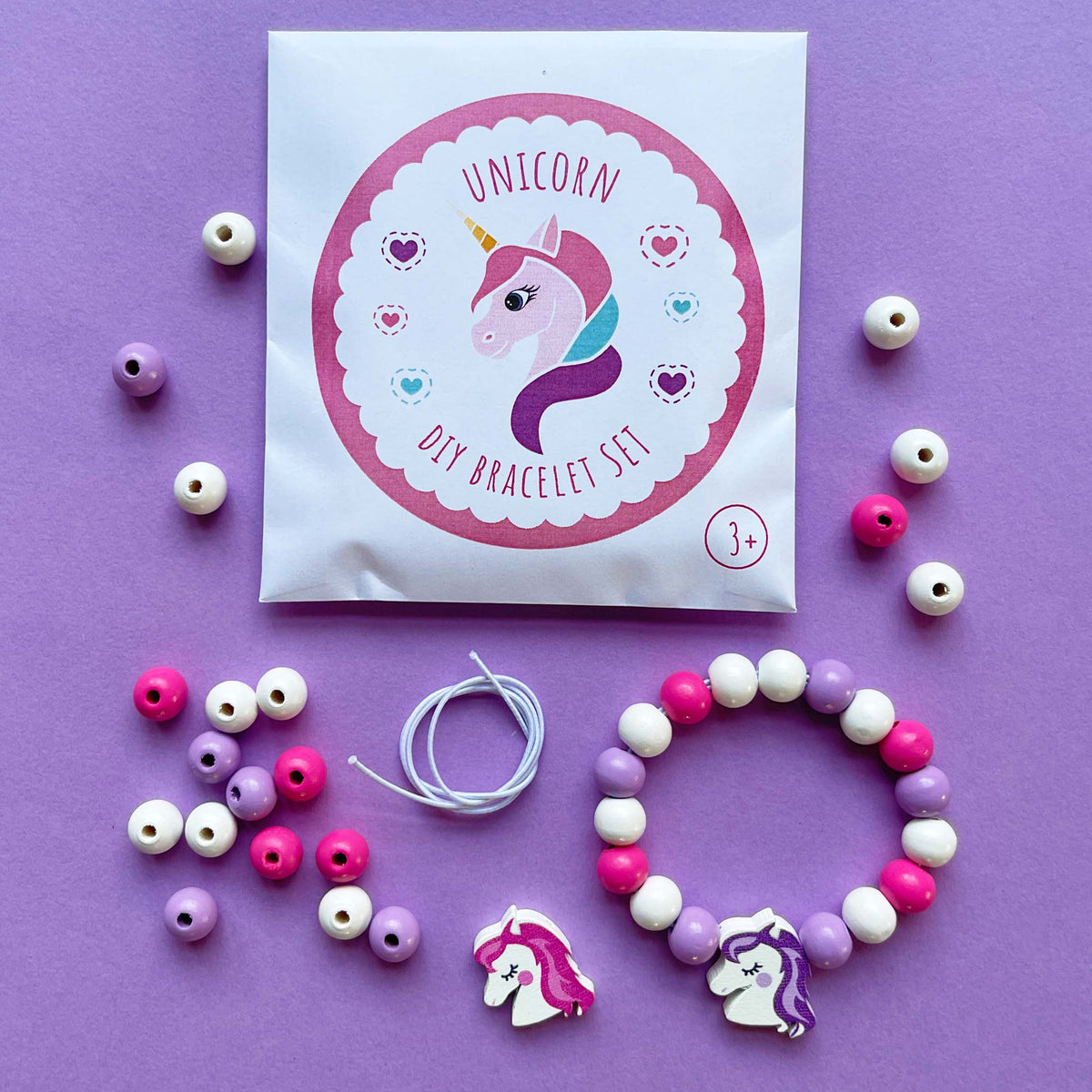 Unicorn DIY Bracelet - wooden beads — one included in Eco Unicorn Party Bag; assorted designs shown where applicable