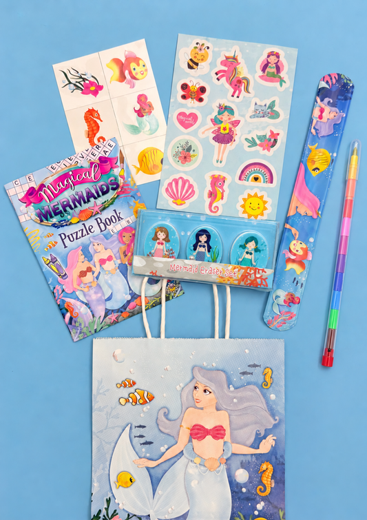 Mermaid value party bag with sticker sheet, snap bracelet, tattoos, puzzle book, mermaid eraser set and rainbow nib pencil