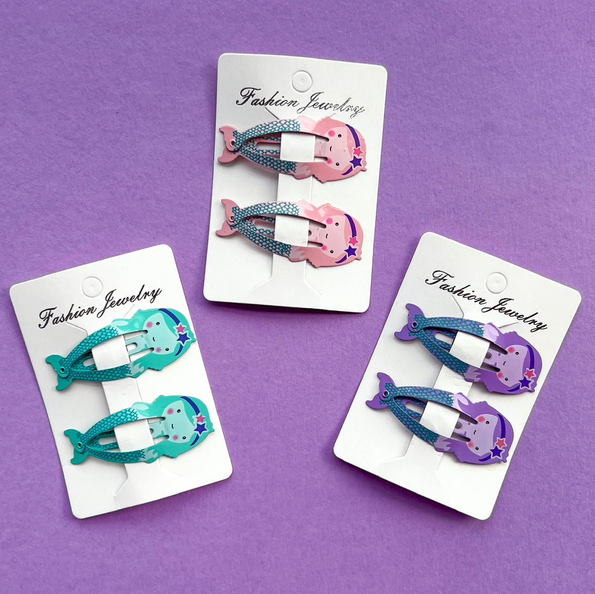 Mermaid hair clips in assorted colours; one pair included