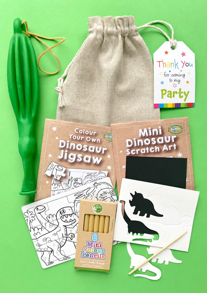 Stegosaurus eco cotton party bag with six mini colouring pencils, dinosaur colouring jigsaw, scratch art and green punch balloon